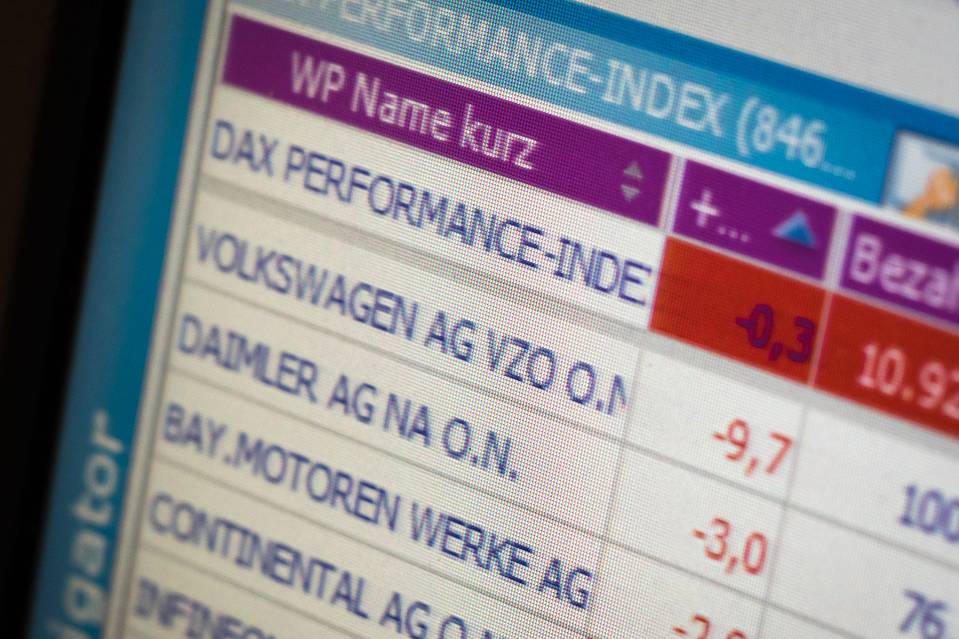 A monitor shows Volkswagen share losses on Nov. 4, 2015, just one of the many rocky days for the auto maker’s stock. Investors allege that Volkswagen failed to inform financial markets about a continuing investigation.