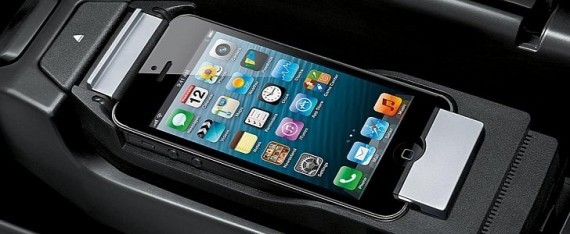 Mobile phone holder for BMW vehicles - iPhone pictured How To Update BMW's Phone Cradle Firmware - A Brief Guide
