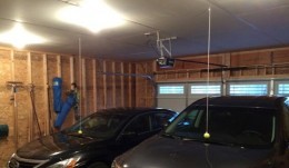Hanging tennis balls in a four-car garage to make sure everyone does not exceed their spots Ten Cheap Car Hacks That May Help You Deal With Day-To-Day Issues